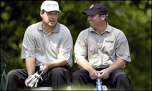 Loren Roberts (left) and Chris Smith chat at the fifth tee during the final round.