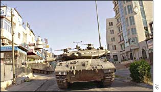 An Israeli tank rolls into Ramallah on 10 June