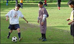 Youngsters playing football