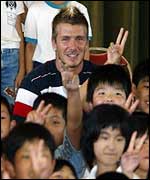David Beckham visits Japanese children  