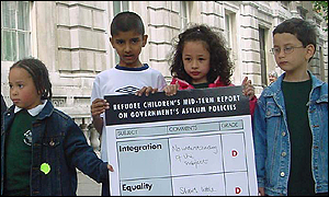 Children hand in a petition at the Home Office