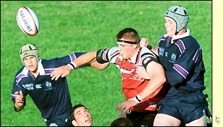 Ron Johnstone is crowded out by Scotland players