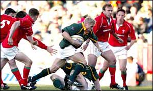 Brent Russell takes on the Wales defence in Bloemfontein