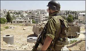 Israeli soldier outside Ramallah refugee camp