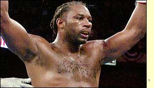 Lennox Lewis celebrates after beating Mike Tyson in the early hours of last Sunday