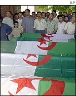 Coffins of people killed in rebel attack
