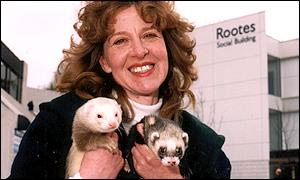Researcher June McNicholas and ferrets 