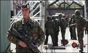 Soldiers patrolling a 'peace line' in East Belfast