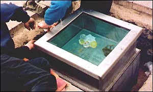 Glass pavement art work