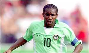 Okocha (left) has now retired from international football