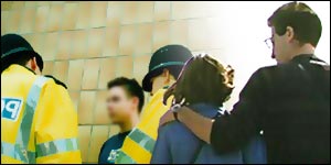 Police speak to a teenager