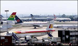planes on runway at Heathrow airport