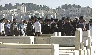 Mourners at the funeral of Moshe Gotlieb, one of 19 killed in a bomb attack on Tuesday