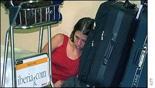A traveller waits at an airport near Madrid 