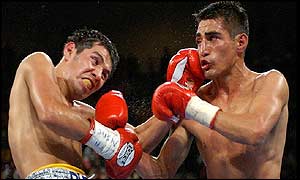 Marco Antonio Barrera and Erik Morales trade blows