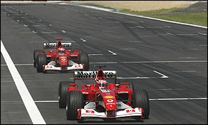 Rubens Barrichello leads Michael Schumacher across the line at the Nurburgring