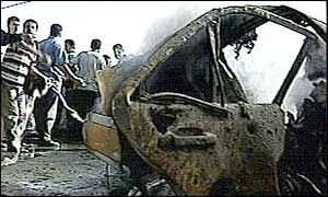 wreckage of car after Gaza missile strike