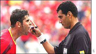 Spanish captain Fernando Hierro vents his frustration with Egyptian referee Gamal Ghandour 