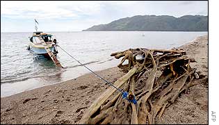 A boat is anchored on the coast of Sibuco town,  Zamboanga del Norte province