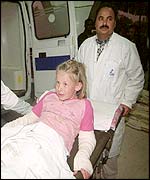 A young girl is taken to hospital after the blast