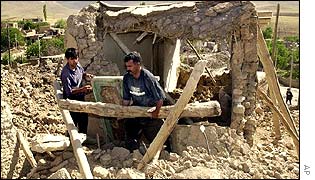Residents scouring the debris to salvage valuables