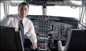 John Travolta in his aeroplane cockpit
