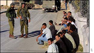 Israeli soldiers roundup Palestinians in Ramallah