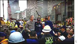 President George W Bush with rescue workers