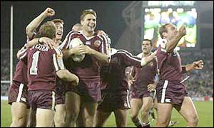 Queensland celebrate their title-saving try