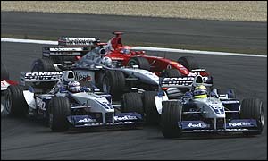Juan Pablo Montoya and Ralf Schumacher battle for the lead at the first corner at the European Grand Prix