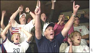 Americans cheering their football team