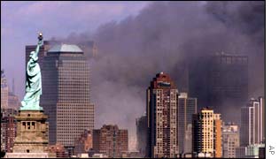 Smoke rises from the ruins of the World Trade Centre