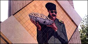 Why is Saddam still portraying his people as victims of western sanctions if some international aid has been arriving? 