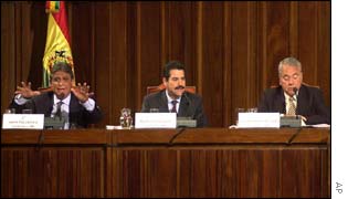 Presidential candidates Jaime Paz Zamora, left, Manfred Villa, centre, and Gonzalo Sanchez de Lozada, right, participate in a debate in La Paz