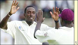 Collins celebrates the wicket of Mark Richardson