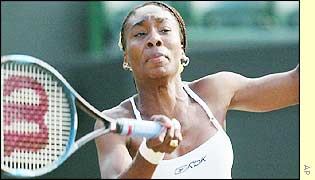 Venus Williams lunges for a forehand