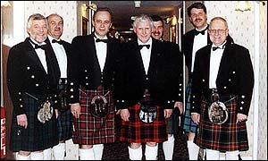 Men in kilts at Scottish wedding