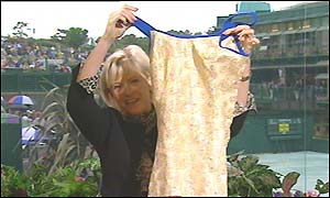 Sue Barker shows off the tennis dress she wishes Pat Cash to wear if he loses the bet