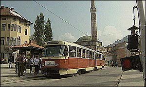 A tram picks up passengers in Sarajevo