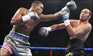 Felix Trinidad, who has announced his retirement at the age of 29, against Hacine Cherifi