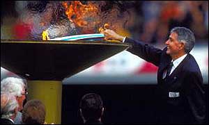 Ron Clarke lights the Olympic cauldron