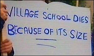 Protest sign over village school closure 