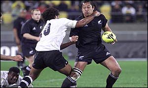 Tana Umaga (right) in action against Fiji