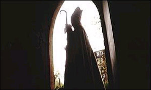 A bishop in a church doorway