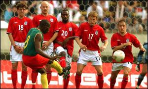 Njitap takes a free kick against England in a friendly 