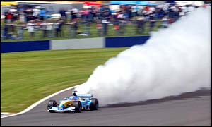 Jenson Button's engine lets go in spectacular fashion, forcing the British driver into the spare car