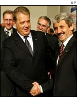 Latvian Prime Minister Andris Berzins, left, and Slovakia's Prime Minister Mikulas Dzurinda 
