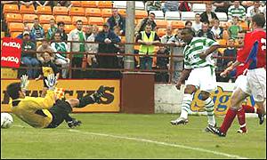 Didier Agathe scores for Celtic against Shelbourne