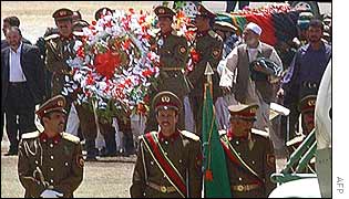 Qadir's coffin is carried to a helicopter for the flight to Jalalabad