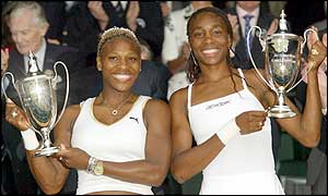 Serena and Venus Williams celebrate winning the Wimbledon doubles